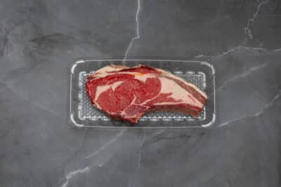 DRY AGED BONE IN RIB EYE STEAK